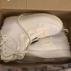 Women’s white high top sneakers